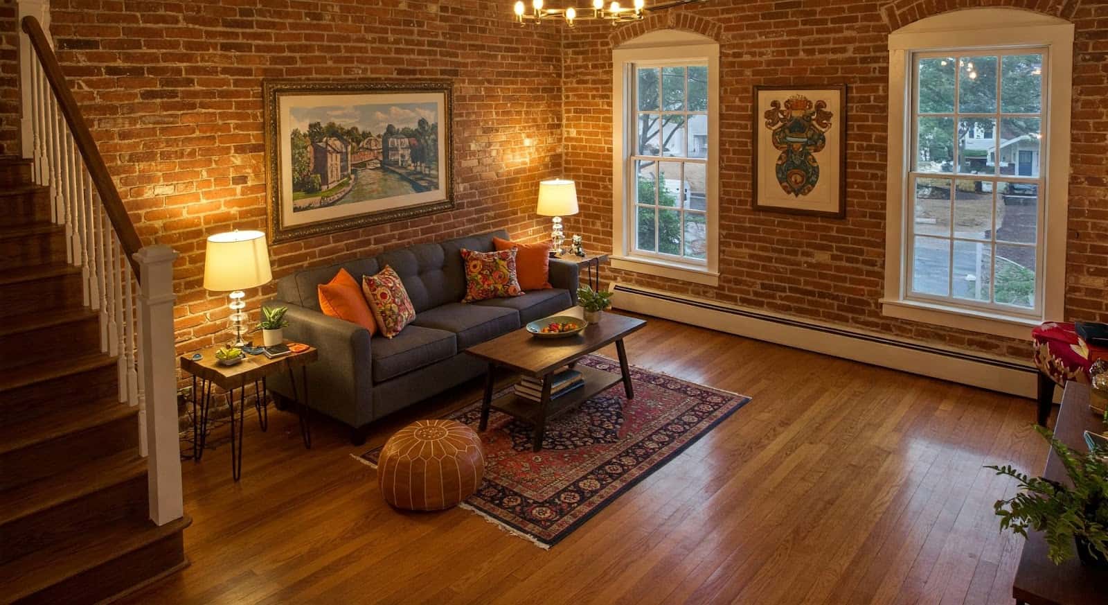 Renovated living room with hardwood floors, recessed lighting, and modern furniture in Colonial Heights VA